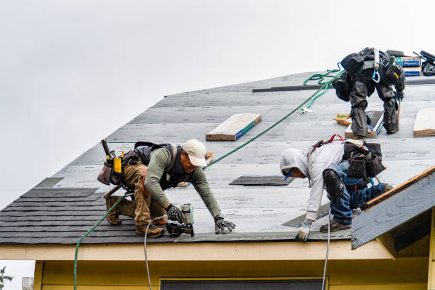 Professional Roofing technician working in Harrisville, RI